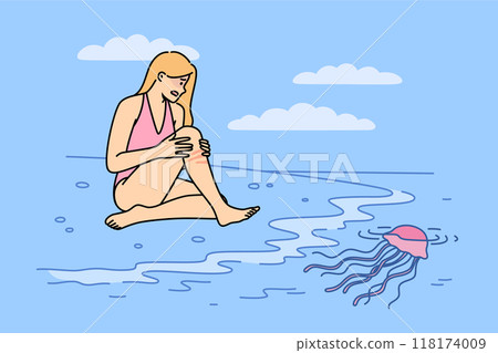 Jellyfish left burn on woman body after coming into contact with underwater in tropical ocean Jellyfish left burn on woman body after coming into contact with underwater in tropical ocean 118174009