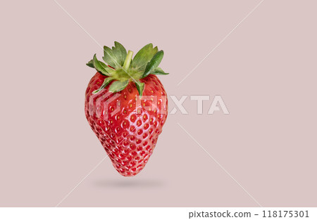 Juicy single strawberry on a pink background close up. Farm ripe healthy berries.  118175301