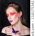 Woman with Artistic Makeup and Butterfly 118175342