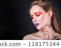Sensitive Woman with Artistic Makeup 118175344