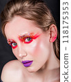 Close-up Portrait of Woman with Artistic Makeup 118175353