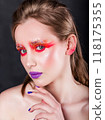 Close-up of Woman with Colorful Artistic Makeup 118175355