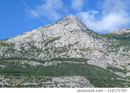 View of the Biokovo mountain range of the Dinaric Alps from Makarska riviera, Adriatic coast of Croatia 118175765