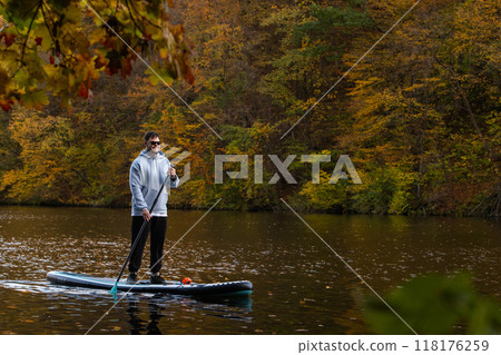 Paddleboarding in Autumn Serenity 118176259