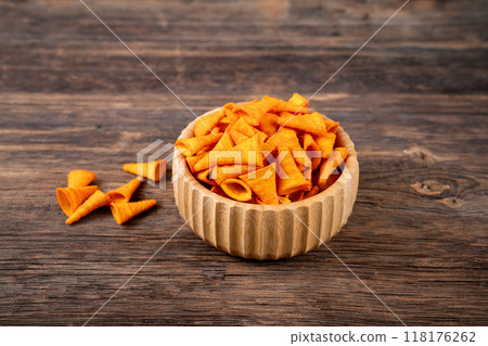 Cone corn chips on wooden background stock photo. 118176262