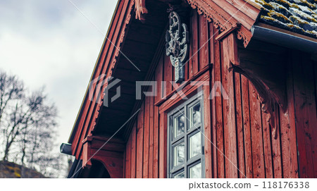 This high-quality photo captures the intricate architectural details of a traditional Norwegian village. Generative AI 118176338