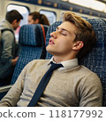 Man sleeping on the train 118177992