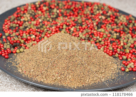 Ground pepper, a mixture of red, green, white and black pepper. 118178466