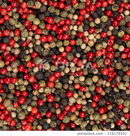 A mixture of different peppercorns white, black, red and green peppers spices. 118178501