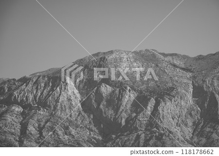 View of the Biokovo mountain range of the Dinaric Alps from Makarska riviera, Adriatic coast of Croatia 118178662