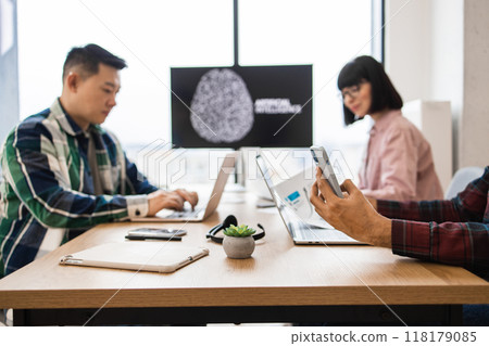 Teamwork session on artificial intelligence development in modern office Teamwork session on artificial intelligence development in modern office 118179085