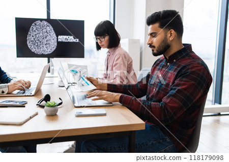 Office colleagues working on artificial intelligence project 118179098
