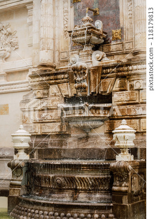 A stone carved fountain on the wall of the Yildiz Palace in Istanbul. A stone carved fountain on the wall of the Yildiz Palace in Istanbul. 118179813