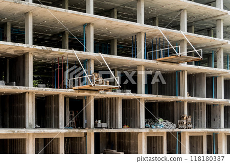 A new modern multi-storey residential building under construction 118180387