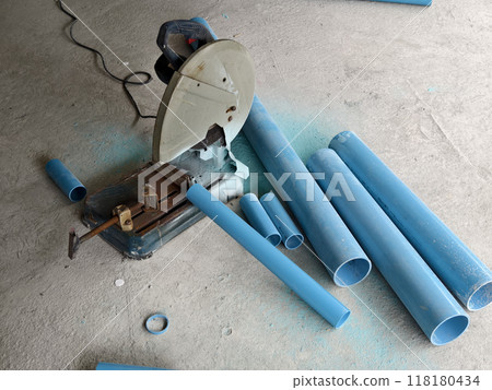 A machine for cutting pipes at construction site 118180434