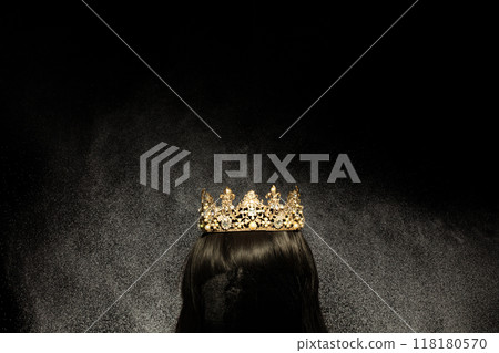 Gold Crown Diamond on hair wig model head. Sparking glitter diamond crown ready to put on winner wear head of Miss Beauty pageant contest. Black background isolated with aura stream 118180570
