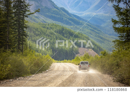 Korean SUV on a dirt road in forest Korean SUV on a dirt road in forest 118180868