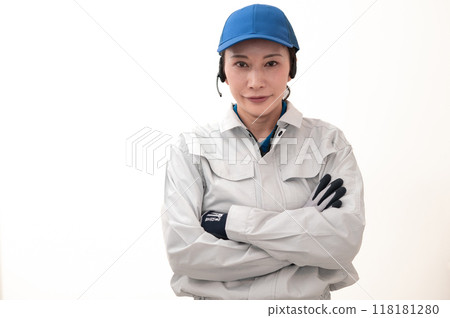 Female truck driver with arms folded 118181280
