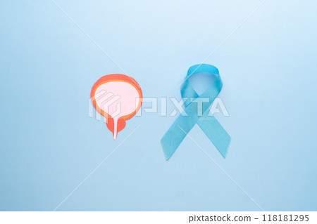 Men's health and Prostate cancer awareness campaign in November. Light blue ribbon awareness and bladder with prostate gland anatomy on blue background. Symbol for support men who living with cancer. 118181295
