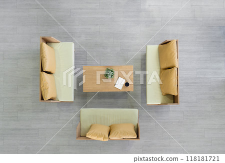 High angle view of modern coworking space. Coffee cup, flower pot and spiral notebook are on wooden table. High angle view of modern coworking space. Coffee cup, flower pot and spiral notebook are on wooden table. 118181721