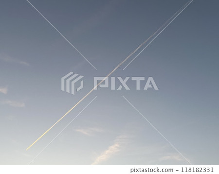 Contrail floating in the twilight sky Contrail floating in the twilight sky 118182331