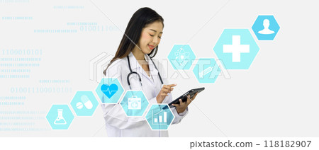 Female doctor in a white lab coat typing on tablet computer, showing symbol of medicine innovation, treatment, discovery and healthcare analysis. Female doctor in a white lab coat typing on tablet computer, showing symbol of medicine innovation, treatment, discovery and healthcare analysis. 118182907