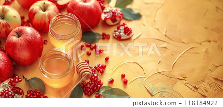 Rosh Hashanah Jewish New Year holiday concept Traditional symbols Honey jar apples pomegranate 118184922