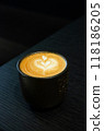 hot latte coffee in black cup on black table 118186205