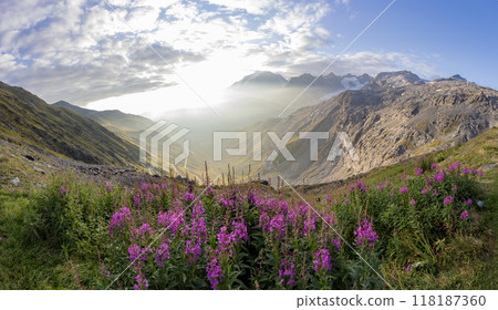 Impressive sunrise at italian Dolomiites. Wonderful Picturesque landscape with colorful dramatic sky over the mountain valley. 118187360