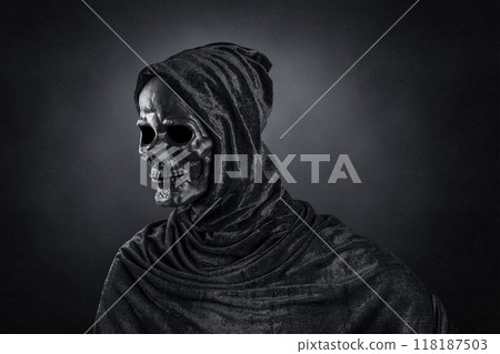 Grim reaper over dark misty background 118187503