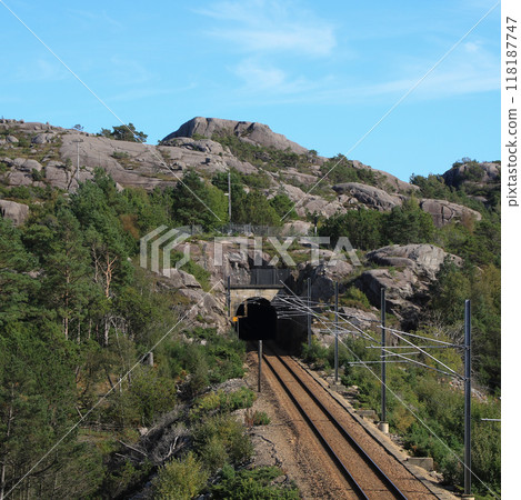 Fun park like rock landscape and railway tunnel in Hellvik, Norway. Fun park like rock landscape and railway tunnel in Hellvik, Norway. 118187747