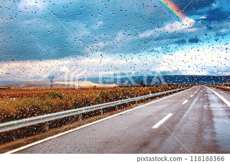 Car and road in stormy day.Safety drive concept. Car and road in stormy day.Safety drive concept. 118188366