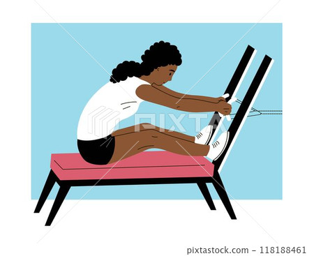 Young woman doing exercises on a sports simulator 118188461