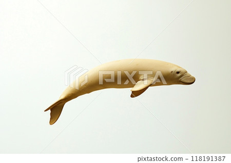 dugong swims elegantly, its streamlined form and paddle-like tail demonstrating effortless movement through the tranquil waters. The creature embodies beauty and grace in its natural habitat. 118191387
