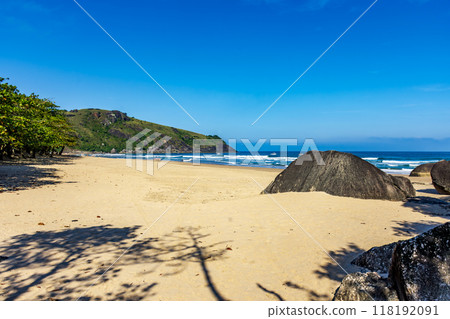 Remote Bonete beach surrounded by hills and forests 118192091