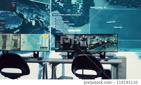 Federal agency control room equipped with surveillance and radio system to oversee threats or danger on a world map. Military command center space with a dashboard and big data visualization. Federal agency control room equipped with surveillance and radio system to oversee threats or danger on a world map. Military command center space with a dashboard and big data visualization. 118193110