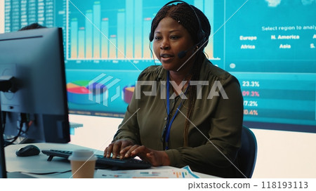 Project leader conducts a market research for progress achievement, understanding the current organizational situation. Consultant working on investments to fulfill company objectives. Camera A. 118193113