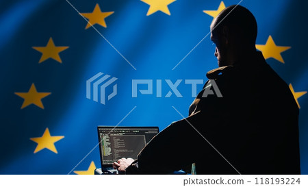 EU alliance engineer protecting against fake accounts on social media promoting totalitarian governments interests. Technician working for European Union doing cybersecurity job, camera B 118193224