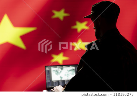 Chinese Air and Space Force unit responsible for China air defense, relaying instructions to squadrons patrolling over borders. CCP government military specialist uses laptop software to do monitoring 118193273