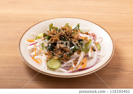 Japanese-style seaweed and small sardine salad Japanese-style seaweed and small sardine salad 118193402