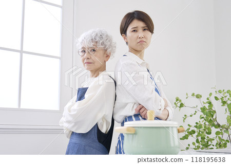 Bad relationship between mother-in-law and daughter-in-law in the kitchen 118195638