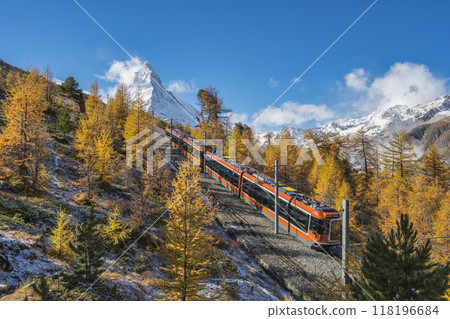 Zermatt Switzerland nature landscape of Matterhorn mountain peak and Gornergrat bahn train in Autumn Season 118196684