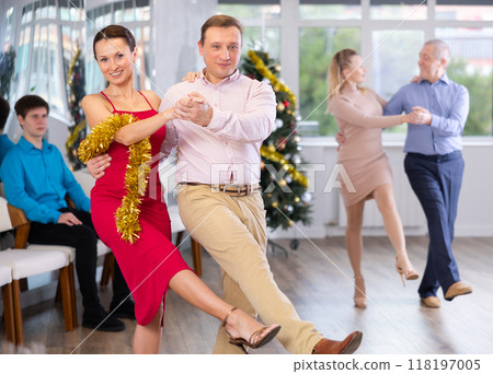 Incendiary paso doble dance during Christmas or New Year celebrations in dance studio 118197005