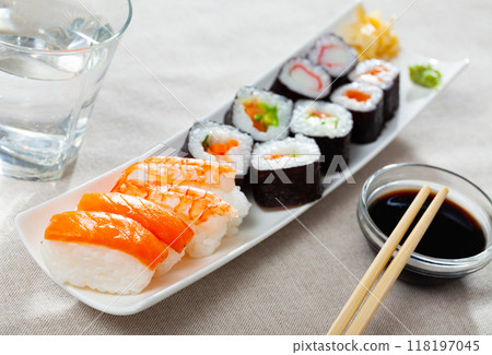 Various of nigiri and hosomaki sushi traditionally served with wasabi and soy sauce 118197045
