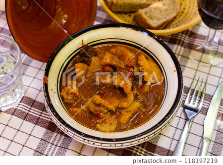 Portion of stewed tripe is cooked in plate - stomach of cattle 118197219