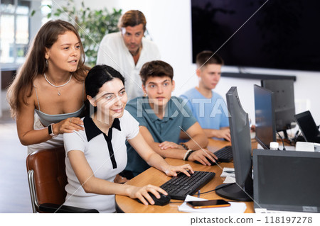 Group of students collaboratively works Group of students collaboratively works 118197278