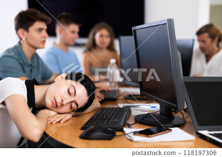 Exhausted students find solace in sleep Exhausted students find solace in sleep 118197306