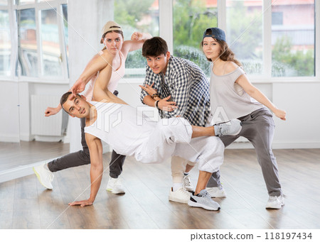 Women and men improvise, move on whim, and perform voluntary movements hip hop dance 118197434