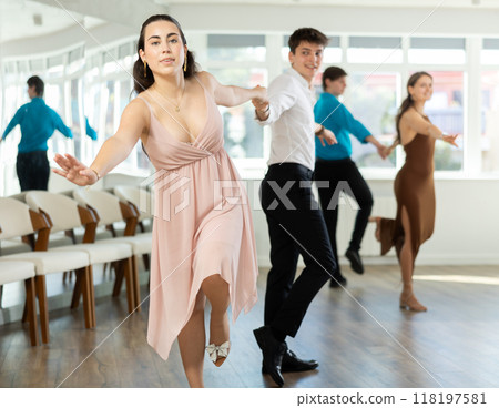 Couple young woman and man dancing twist 118197581