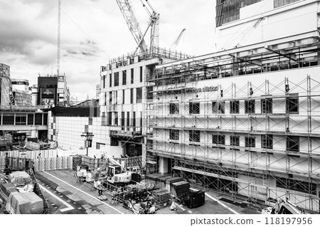 Tokyo redevelopment: Construction work underway at the west exit of Shibuya Station, end of August 2024, monochrome 118197956